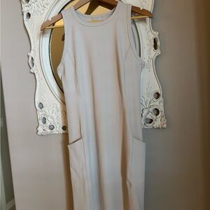 Zella Elegant Sleeveless Athetic Dress in Cream